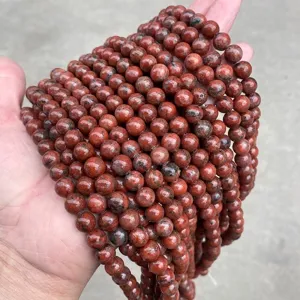 Hebras de cuentas redondas de jaspe sésamo rojo natural para hacer joyas DIY