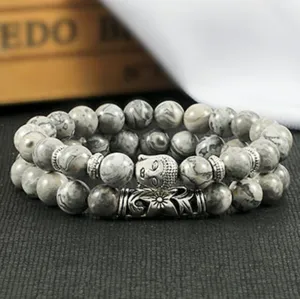 8mm grijs stenen kralen armband set met boeddha hoofd en zilveren bloemhanger voor dagelijks gebruik.
