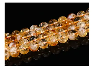 Macro view of natural yellow citrine crystal loose beads for DIY jewelry making