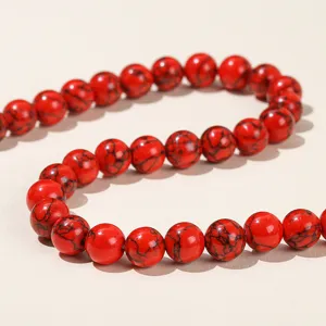 Vibrant red synthetic turquoise beads with black matrix pattern for DIY jewelry making