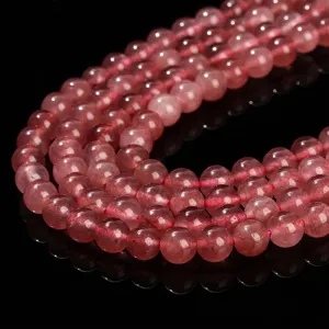 Professional macro view of 8mm pink strawberry quartz round beads for DIY jewelry