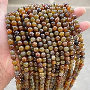 Macro view of brown dragon vein agate round beads with unique detailed crackle patterns