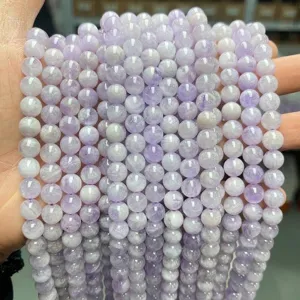 Detailed view of natural light purple amethyst round beads for DIY jewelry making