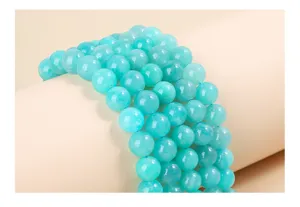 Close-up of natural ice-type Amazonite round beads with smooth polished finish.