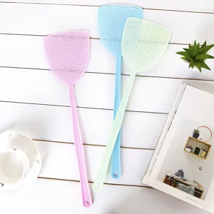 Close-up detail of durable plastic fly swatters in pastel colors, ideal for home mosquito control.