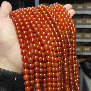 Macro view of high-quality 5A red agate round beads strands for DIY jewelry jewelry making
