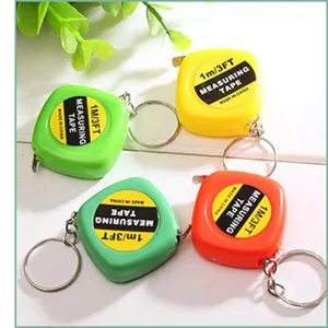 Mini retractable 1m tape measure keychain portable pocket measuring tool for daily use.
