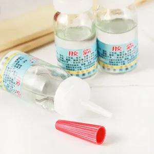 Colle liquide transparente à séchage rapide adhésif pour réparation de plastique et métal
