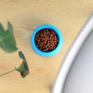 Durable blue plastic pet bowl for dogs and cats, round single food feeder for daily feeding.