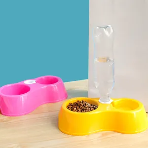Double pet bowls with water dispenser bottle for dogs and cats, plastic feeder set for pets.