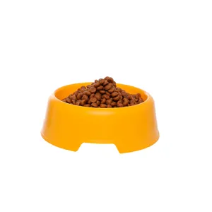 Yellow plastic pet bowl for dogs and cats, durable round single food feeding basin container.