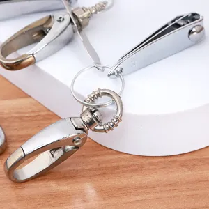 Multi-functional metal keychain set including nail clipper and ear pick for daily use
