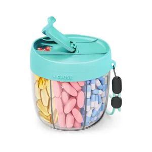 Portable 7-day pill organizer detail view, clear compartments and secure cyan lid design.