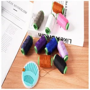 Colorful sewing thread spools and needle box detail, ideal for DIY hand sewing and clothing repair.