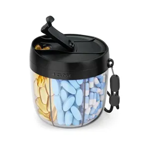 Portable 7-compartment pill organizer, clear plastic vitamin container for travel and daily use.