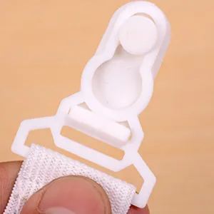 White plastic bed sheet fastener clip with elastic band for anti slip bedding holder.