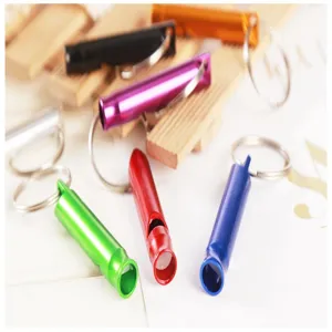 Colorful aluminum survival whistle keychain detail showing vibrant metal colors and portable design.