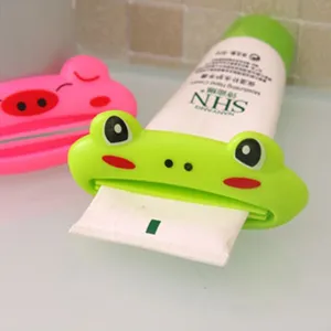 Cute cartoon animal toothpaste squeezer, plastic manual dispenser for facial cleanser and cream.