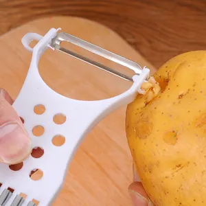 Pelador de verduras multifuncional para patatas con hoja de acero inoxidable y mango blanco.