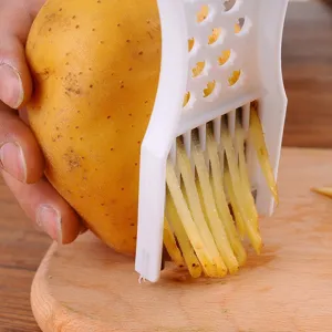 Cortador de patatas de plástico utensilio de cocina para picar verduras rápidamente.