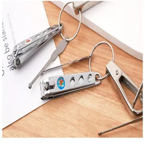 Stainless steel nail clipper keychain set with ear pick and ring, portable daily metal tool.