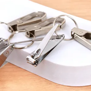 Stainless steel nail clipper keychain set portable multi functional metal pocket tool for daily use.
