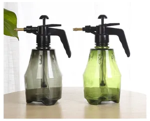 Detail view of manual pressure plant watering sprayers, 1.5L plastic garden sprinkler bottle.