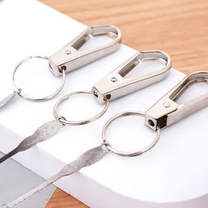 Portable metal keychain with built-in ear pick, practical ear cleaning tool for daily use.