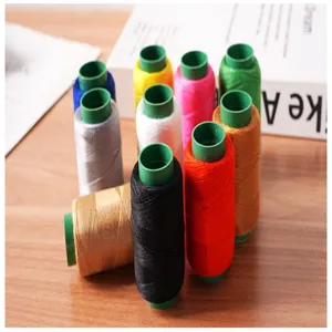 Colorful sewing thread set small spools for DIY clothing repair and hand stitching crafts.