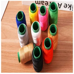 Colorful sewing thread detail shot, vibrant spools arranged nicely for hand repairing work.