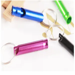 Colorful aluminum alloy survival whistles with keyrings, portable outdoor survival gear.