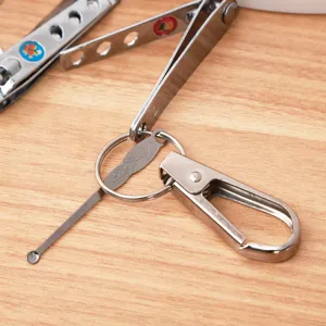 Stainless steel keychain multi-tool featuring nail clipper, ear pick and metal clasp.