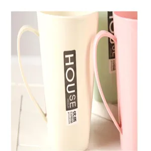 Close-up detail of simple solid color plastic mouthwash toothbrush cup for bathroom use.