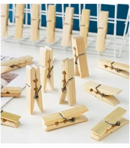 Natural wooden bamboo clips for photo hanging, home organization, and laundry drying.