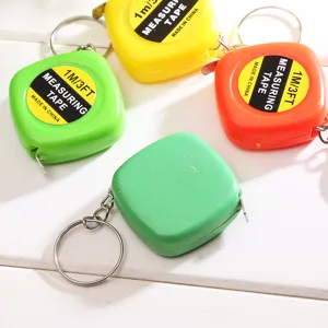 Mini portable 1M/3FT measuring tape keychain with colorful shell, perfect for daily use and gifts.