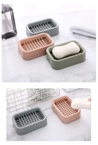 Double layer plastic soap dish with grid drain design for bathroom and travel use details.