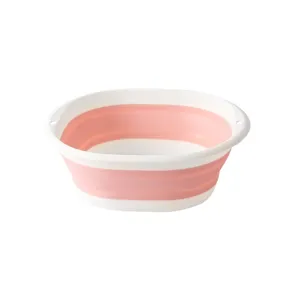 Portable collapsible wash basin, pink and white folding bucket for travel, home and dorm use.