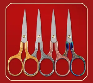 Stainless steel retro scissors set with floral embossed handles for embroidery and crafts.