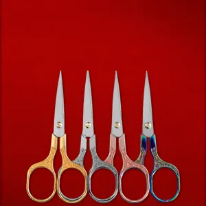 Vintage plum blossom stainless steel scissors with elegant carved handles for sewing and craft.