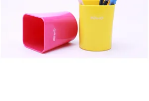 Plastic round pen holder and desk organizer set in vibrant pink and yellow colors for office.