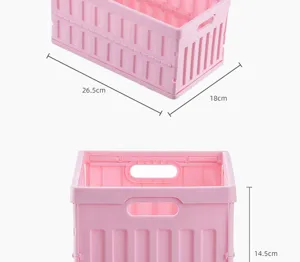 Pink plastic foldable storage basket portable desktop organizer crate with convenient handles.