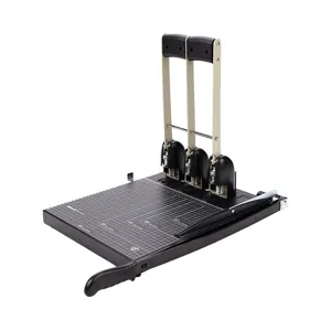 Heavy-duty 3-hole punch and paper cutter with grid alignment board for office archives.