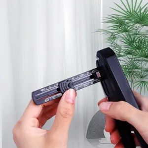 Adjustable hole puncher with precise locator ruler for loose-leaf paper and DIY crafting.