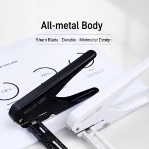 Heavy duty single hole puncher with adjustable guide ruler for loose-leaf paper and stationery binding.