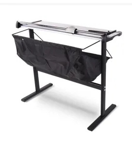 Professional vertical paper trimmer with stand and collection bag for large documents.