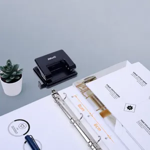 KW-trio 4-hole paper punch and loose-leaf binder file organizer for office and school.