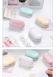Close-up detail of mini 3-hole puncher in pastel colors, perfect for DIY planner notebooks.