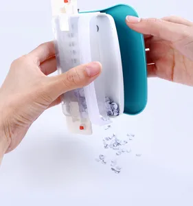 Manual multi-hole punch for loose-leaf paper, A4 paper binder, portable desktop stationery tool.