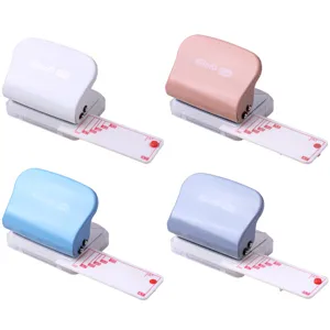 KW-trio multi-hole paper puncher with size guide ruler, manual loose-leaf binder punch tool.