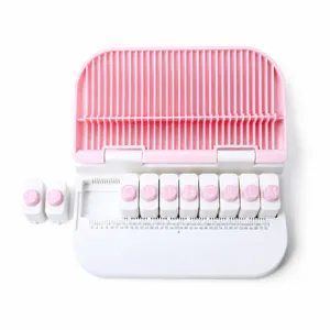 Pink letter punch machine for DIY crafting, greeting cards, and scrapbooking stationery.